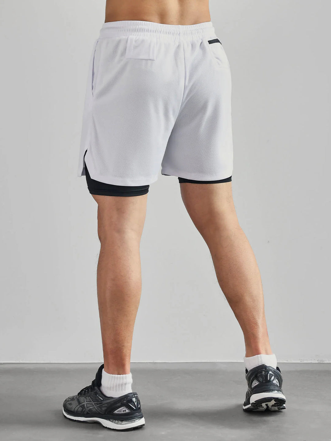 Short Atlético 2 en 1 de 7" con Bolsillos Forrados y Malla Stretch Kinetic - NVRSFT®